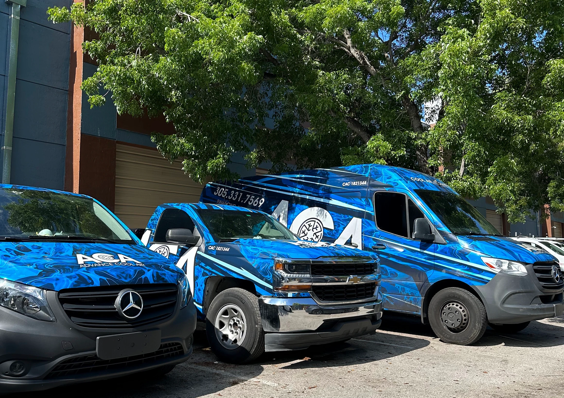 Advance Cool Air & Plumbing service trucks staged for AC and plumbing calls near Jupiter